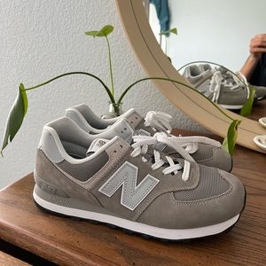 New Balances, size W9 or M7.5
